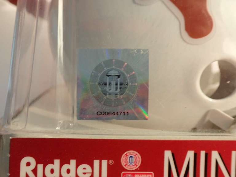 FACTORY SEALED RIDDELL THROWBACK, TEXAS LONGHORNS MINI HELMET