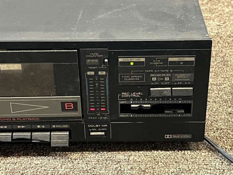 Kenwood stereo double cassette deck KX-55W, powers up, four push buttons have broken bottoms, see pictures for details.
