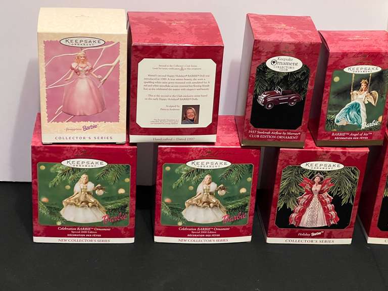 BR4… Tub of assorted Hallmark Barbie ornaments, see pictures for details.
