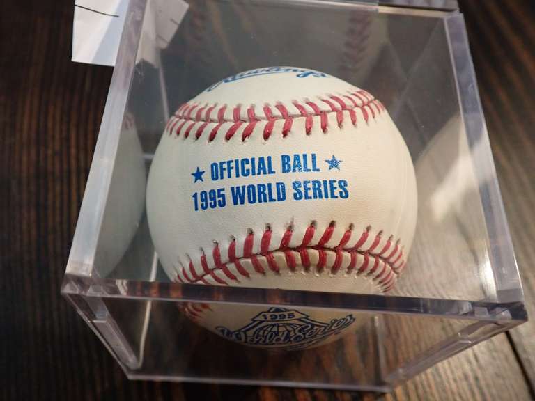 AUTOGRAPHED 1995 WORLD SERIES BASEBALL IN DISPLAY CASE - APPEARS TO BE SIGNED BY JAVIER LOPEZ
