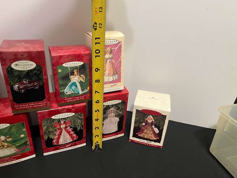 BR4… Tub of assorted Hallmark Barbie ornaments, see pictures for details.