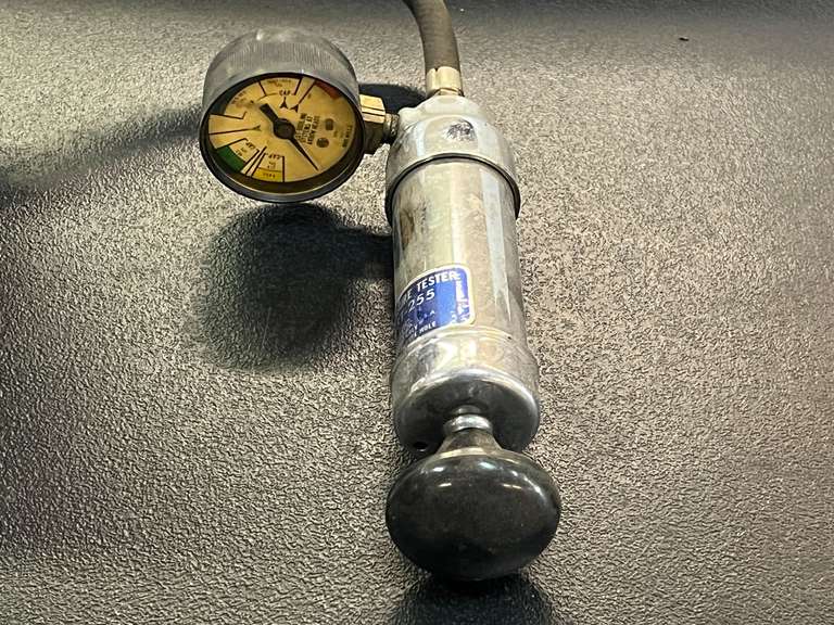 Stant ST 255, cooling system pressure test tester, comes with a carrying case, see for details.