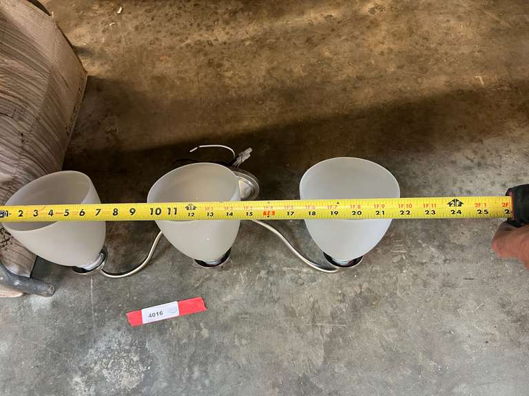 Three receptacle wall mount light fixture, this piece has a nickel finish, see pictures for details.