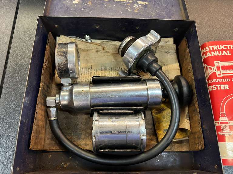 Cooling system pressure test tester, comes with a carrying case, see for details.
