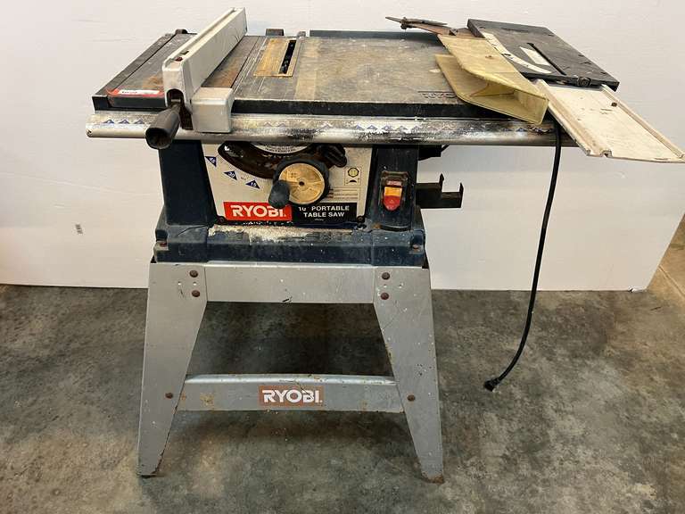 Ryobi 10” table saw with stand, comes with blade cover, and fence. Powers up, take CAUTION, switch is stuck in the on position, see pictures for details.