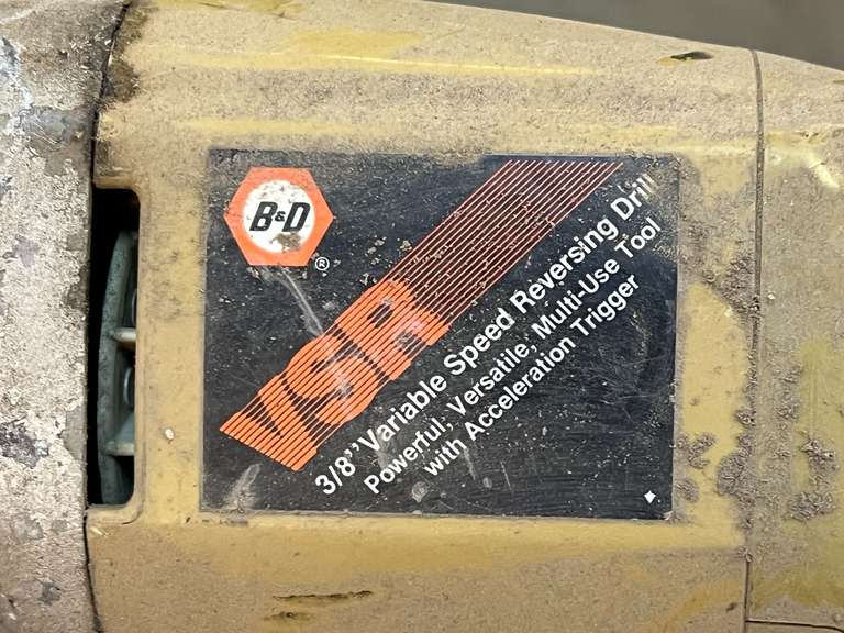 Black & Decker 3/8 inch variable speed reversing drill, powers up, see pictures for details.