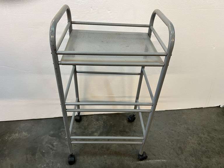 Small rolling utility cart, see pictures for details.
