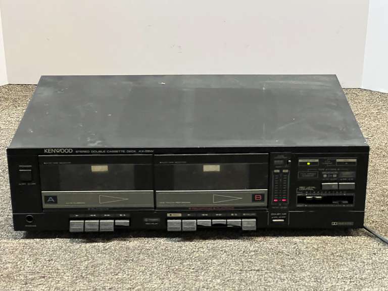 Kenwood stereo double cassette deck KX-55W, powers up, four push buttons have broken bottoms, see pictures for details.