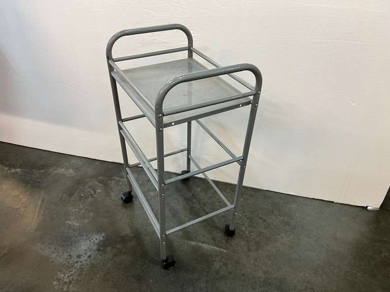 Small rolling utility cart, see pictures for details.