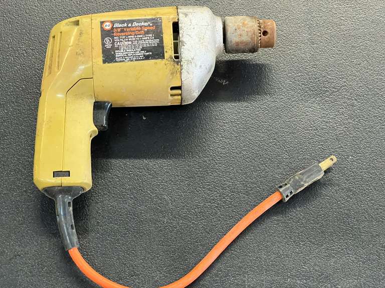 Black & Decker 3/8 inch variable speed reversing drill, powers up, see pictures for details.