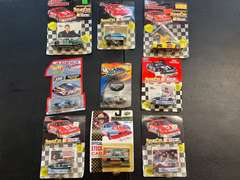 Large assortment of diecast cars, all pieces are unopened, ￼ includes Hot Wheels and Racing Champions, tub is NOT included, see pictures for details.