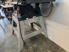 Ryobi 10” table saw with stand, comes with blade cover, and fence. Powers up, take CAUTION, switch is stuck in the on position, see pictures for details.