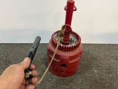 Primitive dinner bell, this piece was fashioned from an old transmission part, see pictures for details.