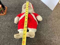 Vintage Christmas Santa doll, also includes the battery operated “bartender” motion doll, see pictures for details.