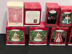 BR4… Tub of assorted Hallmark Barbie ornaments, see pictures for details.
