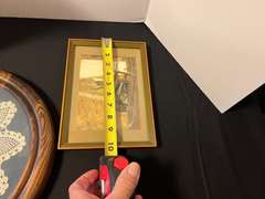 BR1…Assorted home decor to include miniature wall mount curio, framed doily, and more.