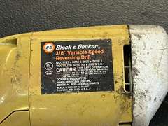 Black & Decker 3/8 inch variable speed reversing drill, powers up, see pictures for details.