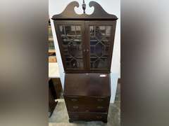 Lovely vintage/antique drop front secretary, decorative hutch has three shelves, this piece also has three drawers. See pictures for details.