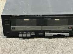 Kenwood stereo double cassette deck KX-55W, powers up, four push buttons have broken bottoms, see pictures for details.