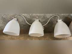 Three receptacle wall mount light fixture, this piece has a nickel finish, see pictures for details.