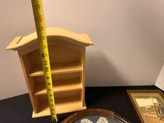 BR1…Assorted home decor to include miniature wall mount curio, framed doily, and more.