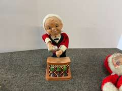 Vintage Christmas Santa doll, also includes the battery operated “bartender” motion doll, see pictures for details.
