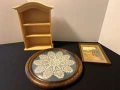 BR1…Assorted home decor to include miniature wall mount curio, framed doily, and more.