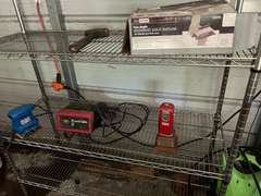 Bay 1 (house)…Two 6-shelf metal wire storage racks with content, also includes content between shelving units. Items include an electric pressure washer, box fan, flat shovel, battery charger, orbital hand sander, dovetail joint fixture, and more. See pictures for details.