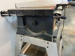 Ryobi 10” table saw with stand, comes with blade cover, and fence. Powers up, take CAUTION, switch is stuck in the on position, see pictures for details.