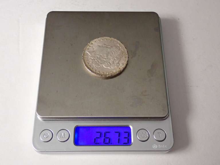 1884-O MORGAN SILVER DOLLAR COIN