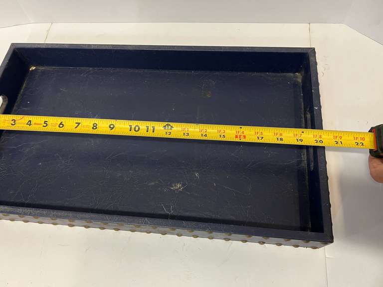 Leather look serving tray with nail head trim, see pictures for details.
