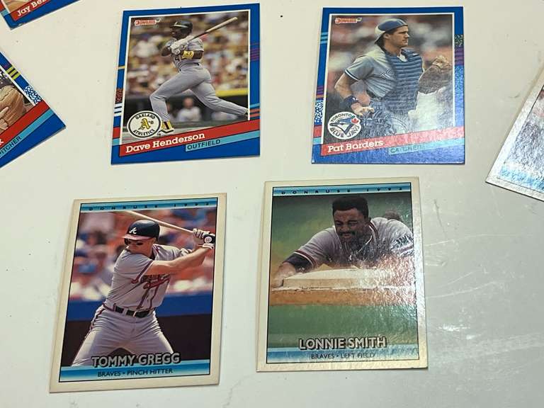 Small container of unsearched sports cards, see pictures for details.