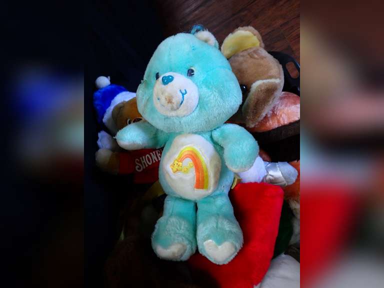 Collection of Plush Toys, Including Care Bear and Shoney's Bear