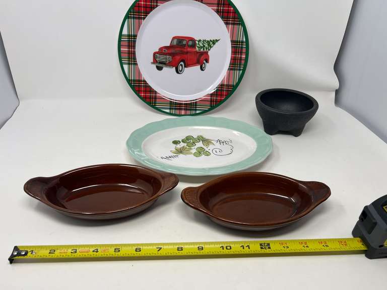 Assorted kitchen items to include a vintage Corona ironstone ware platter, restaurant style salsa bowl, vintage Bel-Terr brown glazed au gratin baking dishes, and plastic Christmas plate. Five pieces total, see pictures for detail details.