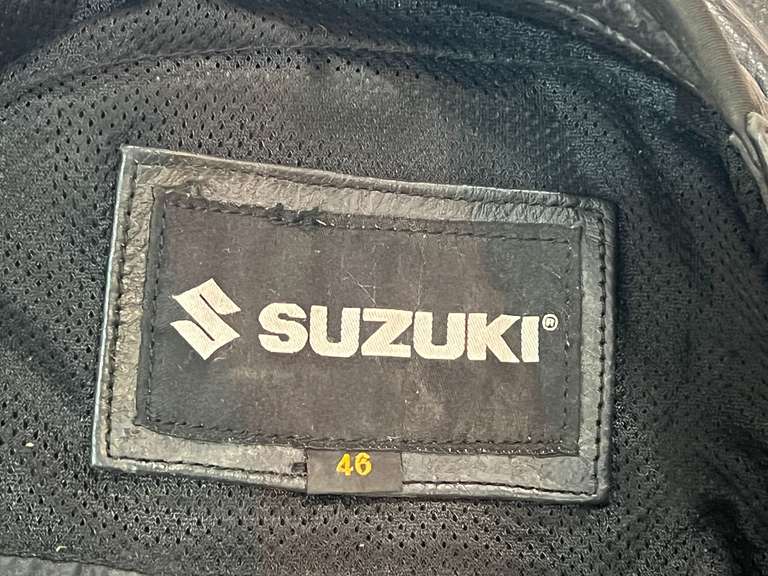 Suzuki racing apparel, jacket and pants, please inspect for size, see pictures for details.