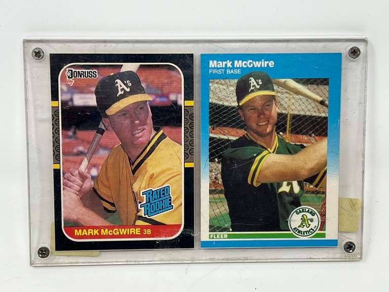 Donruss and Fleer Mark McGwire sports cards, unsearched, comes with display, see pictures for details.