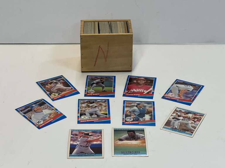 Small container of unsearched sports cards, see pictures for details.