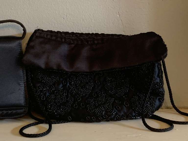 VINTAGE NEW BLACK BEADED EVENING PURSE BY COLUMBINE & VINTAGE NEW BLACK SATIN EVENING PURSE (ONE RHINESTONE MISSING) - DINING ROOM