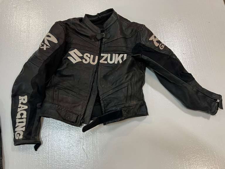 Suzuki racing apparel, jacket and pants, please inspect for size, see pictures for details.