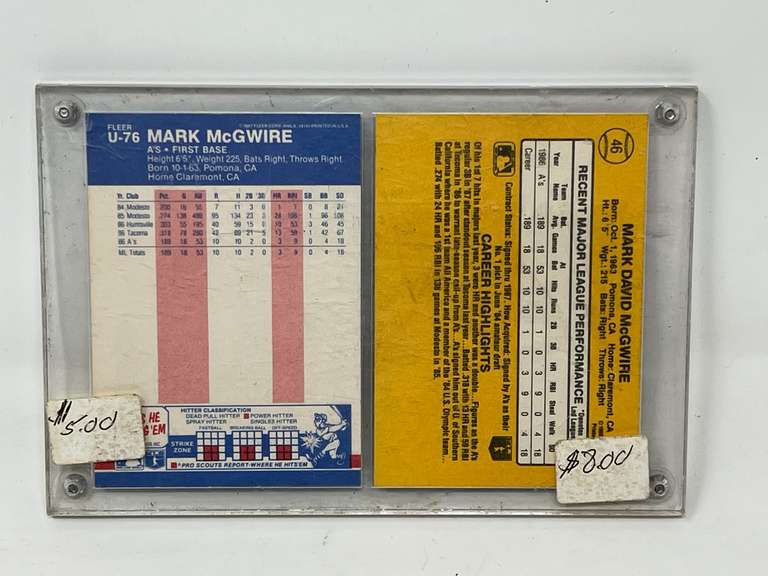 Donruss and Fleer Mark McGwire sports cards, unsearched, comes with display, see pictures for details.