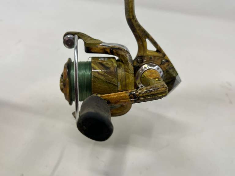 Berkeley Cherrywood graphite fishing rod, comes with an Outdoor Angler SA 30 open face reel, see pictures for details.