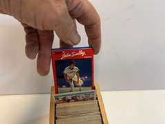 Small container of unsearched sports cards, see pictures for details.