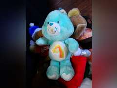 Collection of Plush Toys, Including Care Bear and Shoney's Bear