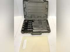 Cutting board with knife set, comes in storage/carrying case, see pictures for details.
