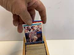 Small container of unsearched sports cards, see pictures for details.