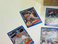 Small container of unsearched sports cards, see pictures for details.