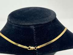 14 karat gold herringbone chain, this piece has been authenticated, 6.1 grams, see pictures for details.