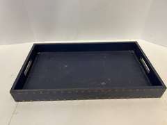 Leather look serving tray with nail head trim, see pictures for details.