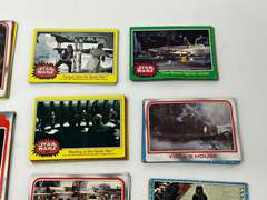 Star Wars trading cards, see pictures for details.