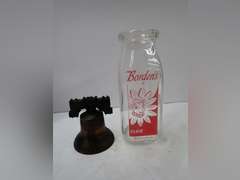 Liberty Bell Replica and Borden's Elsie Milk Bottle